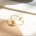 Bague Lune – croissant doré avec 5 zircons sur pierre travertin